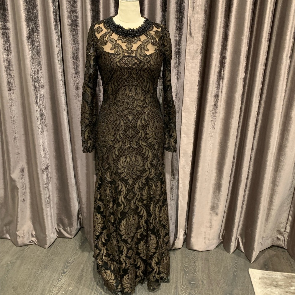 Very elegant, black and bronze dress with a gorgeous sequins neckline